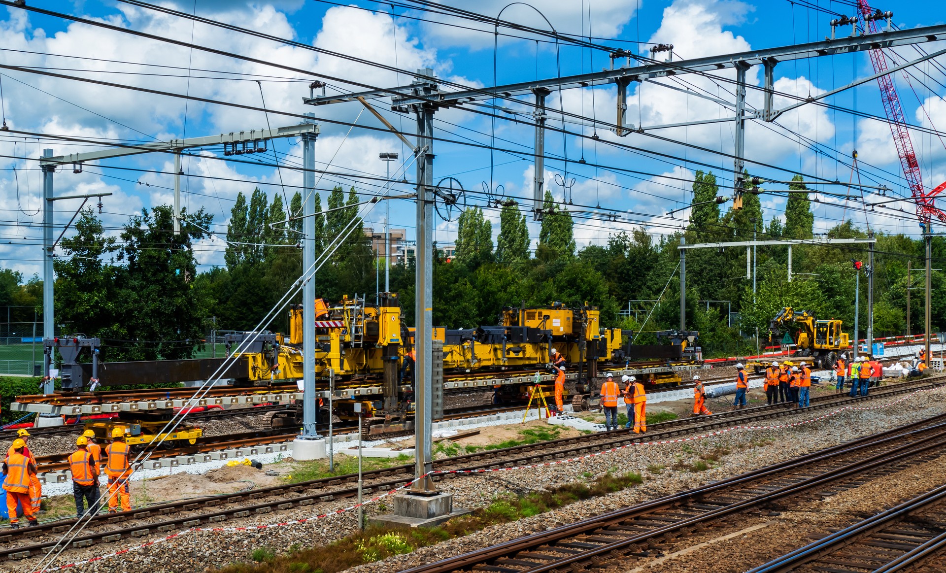 Workers on a large railroad construction project